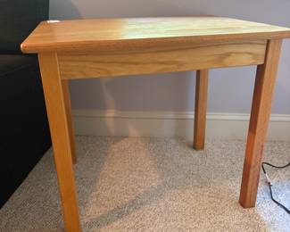 O12 - $25. Solid Wood Side Table. Measures 20” W x 26” D x 22.5” Tall.