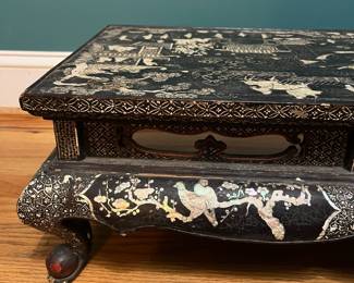 O124 - $850. Antique Kang Table. (Possibly Late Ming-early Qing Dynasty. 17th - 18th Century) Mother of Pearl Inlaid Black Lacquer Low Table. Measures 25" W x 14.5" D x 8.5" Tall.