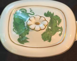 O110 - $400. Set of Wedgwood "Chinese Tigers" Green China. 1 - Coffee Pot, 1 Tea Pot (has a crack), 1 - Saucer, 1 - Trinket Dish, 1 - Cream and Sugar, 3 - Tea Cups, 3 - 8.25" Plates