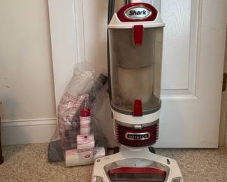 O65 - $100. Shark Professional Vacuum. Model HFD140BWM.