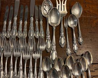 S1 - $7,500. Towle Sterling Flatware Set. 15 of each Dinner Knives, Dinner Forks, Salad Forks, Dessert Spoons. 8 of each Butter Knife, Dinner Spoon. Plus Serving Pieces. Text for Weight.