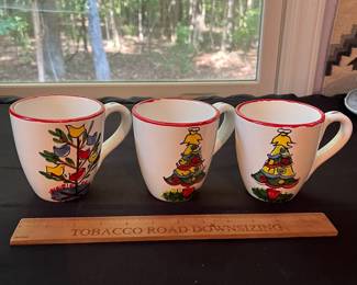 O106 - $25. Set of 3 Vietri Christmas Tree Mugs.