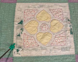 O62 - $65. Vintage Quilt. Measures 65” W x 77” L. Has some worn / thin spots.