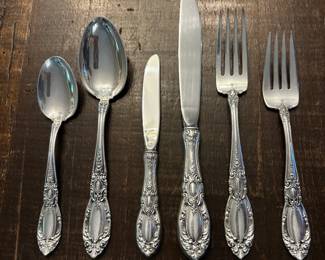 S1 - $7,500. Towle Sterling Flatware Set. 15 of each Dinner Knives, Dinner Forks, Salad Forks, Dessert Spoons. 8 of each Butter Knife, Dinner Spoon. Plus Serving Pieces. Text for Weight.