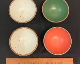 O9 - $80. Set of 4 East Fork Pottery Small Bowls. Measures 4.5" D x 2.25" Tall. White ones show some wear.