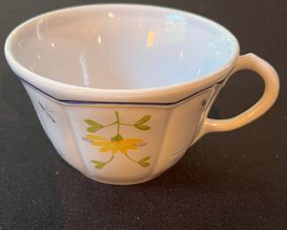 O109 - $275. Set of Longchamp "Printemps" Pottery. 9 - 10" Dinner Plates, 9 - 7.5" Salad Plates, 11 - 6.75" Desert Plates, 11 - 6.25" Saucers, 7 - Tea Cups, 1 Gravy Boat, 1 Sugar Dish.