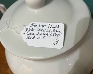 O122 - $45. Blue Wave excess Water Crock with Stand. Crock Holds 2.2 Gallons. Stand Measures 27" Tall.