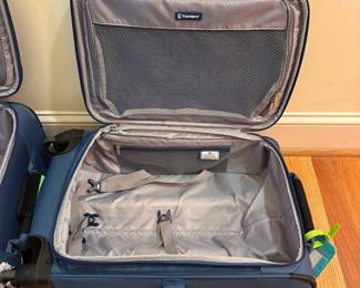 O77 - $80. Travel Pro Maxlite Luggage Set. Soft Side, Expandable, Spinner Wheels. One 25” and one 20”.