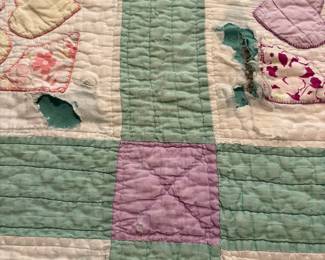 O62 - $65. Vintage Quilt. Measures 65” W x 77” L. Has some worn / thin spots.