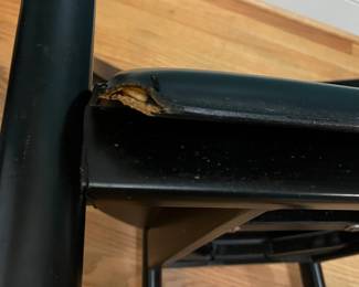 O123 - $75. Pair of Black chairs. Leather Seats. Each Measures 22.5" W x 19" D x floor to seat 17" x floor to back 28" Tall. Both show signs of wear and one seat is damaged on a corner.
