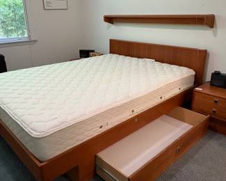 O39 - $250. Queen Platform Bed Frame - Made in Canada. Teak Veneer. Has 2 drawers underneath. This includes Platform Bed Frame, Headboard & Floating Shelf. Measures 64” W x 82.5“ L x 31” Tall.