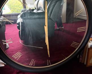 Large wall clock mirrored