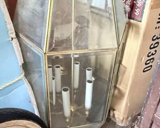 Vintage Brass & Glass Hanging Lantern – Large hexagonal brass-tone hanging lantern featuring beveled glass panels and five candle-style light sockets. A timeless fixture perfect for an entryway, foyer, porch, or traditional home. Untested; sold as found.