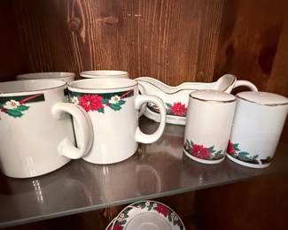 Vintage Christmas Dinnerware Collection – Festive holiday ceramic serving pieces featuring a classic poinsettia and holly pattern. Includes matching coffee mugs, salt and pepper shakers, gravy boat, and coordinating serving pieces. Perfect for Christmas entertaining or adding seasonal charm to your holiday table.