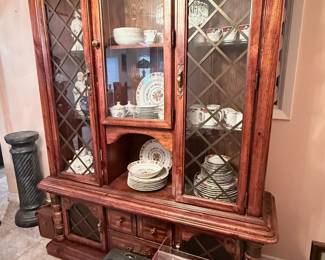 Large Lighted Curio China Cabinet – Beautiful traditional wood curio/china cabinet featuring glass doors with decorative mullions, mirrored back panels, glass display shelves, interior lighting, and lower storage drawers/cabinets. Perfect for displaying china, crystal, collectibles, or heirlooms. Contents sold separately unless noted.