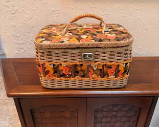 Vintage Sewing Basket with Sewing Notions – Charming woven sewing basket featuring a floral fabric interior and matching exterior trim. Includes an assortment of sewing supplies such as thread, buttons, needles, pins, trim, and other notions. A wonderful find for quilters, crafters, sewists, or vintage sewing enthusiasts. Sold as found with contents.