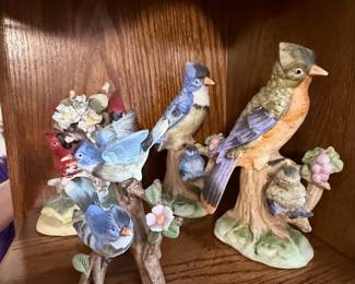 Decorative Bird Figurine Collection – Charming assortment of hand-painted bird figurines featuring bluebirds, songbirds, nests, flowers, and tree branch bases. Beautifully detailed pieces that make lovely additions to cottage, garden, farmhouse, or nature-inspired décor. Sold individually unless noted.