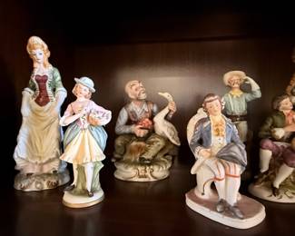 Vintage Hummel-Style Figurine Collection – Charming assortment of porcelain figurines featuring children, angels, musicians, and storybook scenes in hand-painted finishes. A delightful collection for curio cabinets, traditional home décor, or collectors of Hummel-style figurines. Sold individually unless noted.