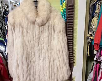 Vintage Genuine Fur Vest – Elegant vintage genuine fur vest featuring a soft natural cream-tone fur, full lining, and a classic collarless silhouette. A timeless statement piece that's perfect for vintage fashion lovers, collectors, or adding classic sophistication to a fall and winter wardrobe. Sold as found.