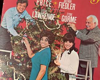 Christmastime in Carol and Song Vinyl Record – Vintage Christmas LP featuring Leontyne Price, Arthur Fiedler and the Boston Pops Orchestra, Steve Lawrence, and Eydie Gormé. A festive addition for holiday music lovers and vinyl collectors. Sold as found; condition not verified.