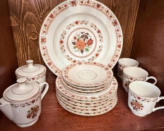 Vintage Floral Dinnerware Set – Elegant vintage dinnerware featuring a classic brown and rust floral pattern with coordinating decorative borders. Includes multiple dinner plates and matching bowls. A beautiful set for everyday use, display, or adding a touch of vintage charm to your table. Sold as a set unless noted.