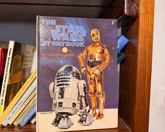 The Star Wars Storybook – Vintage hardcover *The Star Wars Storybook* featuring full-color photographs from the original *Star Wars* film. Published by Random House, this nostalgic collectible is a wonderful addition for Star Wars fans, vintage children's book collectors, or movie memorabilia enthusiasts. Sold as found.