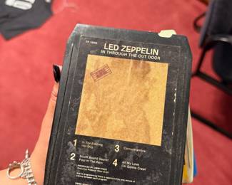 Vintage Led Zeppelin "In Through the Out Door" 8-Track Tape – Vintage 8-track cartridge of Led Zeppelin's 1979 album *In Through the Out Door*, featuring songs including *In the Evening*, *South Bound Saurez*, *Fool in the Rain*, *Carouselambra*, *All My Love*, and *I'm Gonna Crawl*. A great collectible for classic rock fans, vintage audio enthusiasts, and 8-track collectors. Untested; sold as found.