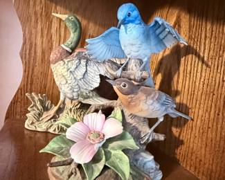 Decorative Bird Figurine Collection – Charming assortment of hand-painted bird figurines featuring bluebirds, songbirds, nests, flowers, and tree branch bases. Beautifully detailed pieces that make lovely additions to cottage, garden, farmhouse, or nature-inspired décor. Sold individually unless noted.