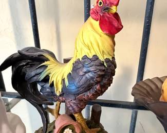**Colorful Rooster Figurine** – Vibrant decorative rooster figurine featuring detailed feathering and hand-painted colors. A striking farmhouse or country décor accent that's perfect for kitchen displays, shelves, or rooster collections.