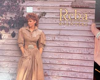 Reba McEntire "Whoever's in New England" Vinyl Record – Vintage LP by Reba McEntire featuring the hit album *Whoever's in New England*, including the title track and other classic country favorites. A great addition for country music fans, Reba collectors, and vinyl enthusiasts. Sold as found; condition not verified.