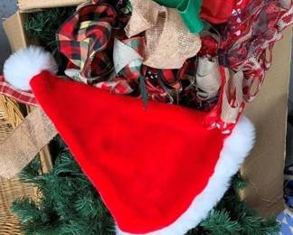 1122 - Assorted Items (Description): Bows, Santa Hat, Felt, 5 ft Lighted Garland Strand