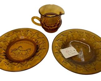 193 - Amber Glass Creamer & 2 Saucers (Description): 5 x 3 x 3