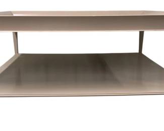4165 - Wildwood Storied House Cocktail Table (Description): 21 x 51 x 51, Storied House Cocktail Table, a perfect blend of classic design and modern versatility. With its transitional style, this table effortlessly complements both traditional and contemporary spaces. Its sleek, tapered legs and clean lines create a refined and sophisticated look, making it a timeless addition to your living space.