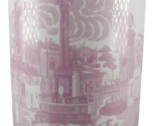 113 - Large Pink and White Umbrella Vase 17"x8" (Description): Large pink and white cylindrical vase featuring transferware-style decorative scenes. The body displays classical European architectural and figural motifs including a central monument or column surrounded by period figures in a landscape setting. The upper and lower borders feature vignettes of buildings and pastoral scenes. Measures 17 inches tall by 8 inches in diameter.