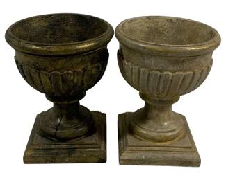 2404 - Pair Decorative Urns 9"x7" (Description): A pair of compotes with classical urn-form styling featuring fluted bowls on pedestal bases with square feet. Each measures 9 inches by 7 inches.