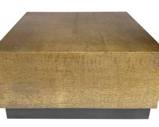 7021 - Alden Home Ketan Square Cocktail Table (Description): Sitting on a wood plinth base finished in Espresso, the Ketan Square Cocktail Table showcases a beautiful textured brass table top and sides in a rich brass finish with subtle burnishing. 18 x 36 x 36