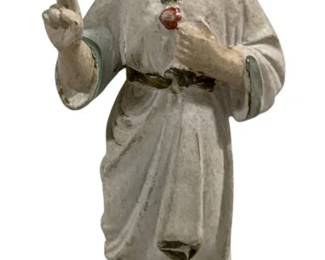 2399 - Religious Statue 11" tall (Description): Religious statue measuring 11 inches tall. The figure depicts a child in flowing robes with one hand raised in blessing and the other holding an object. The statue stands on a circular base with painted details.