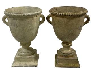 2413 - Pair Decorative Urns 11"x7" (Description): A set of two urns measuring 11 inches by 7 inches. These decorative urns feature a classical design with side handles and square pedestal bases.