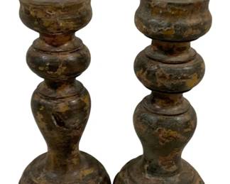 2386 - Pair Wood Candleholders 7" (Description): A set of two candleholders with pricket-style metal spikes for securing candles. Each candleholder measures 7 inches in height. The pieces feature a turned baluster form with a rounded base.