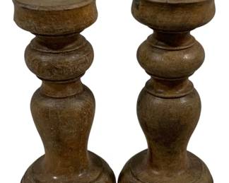 2412 - Pair Wood Candle Prickets 7" Tall (Description): A pair of turned wooden candleholders. Each features a classic baluster form with a circular base and flat top platform for candles. Measures 7 inches tall.
