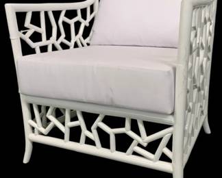4223 - Wildwood Catania Lounge Chair (Description): Retail $3287, 31 x 30 x 32, A deep lounge chair, the Catania is expertly crafted from rattan pole in a modern, geometric pattern. This chair is designed to transport you to a relaxed Mediterranean atmosphere, providing the perfect spot to unwind and soak up the sun. The muslin upholstered cushions provide a comfortable and inviting seat, making it the perfect addition to sunrooms, pool houses, and seaside getaways. For indoor use