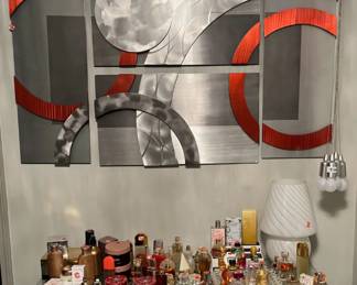 Various perfume and wall art