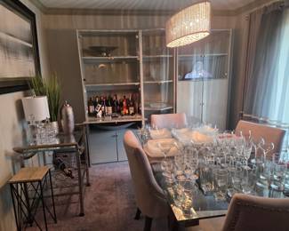 Contemporary curio and glass dining table