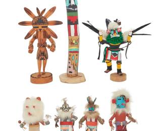 1023 Seven Southwest polychrome katsina carvings Second half 20th century A group of katsina figures in various sizes including a Hopi Maiden 'Rain' kachina by Bruce Harvey, a Sunface figure by D. Kenneth, Diné (Navajo), and other figures including a bear, Mudhead, eagle, and sheep (circa 1992), most with feather, fur, and hide accents Variously marked to base for maker, title, and date 7 pieces Largest height 13 5/8 in., width 3 1/4 in., depth 3 1/8 in.; smallest height 7 in., width 3 1/8 in., depth 2 1/2 in. Estimate: $300 - $500