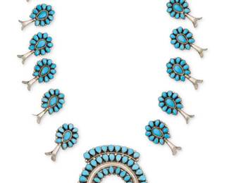 1380 A set of Southwest petit point turquoise squash blossom necklace elements Mid/late 20th century A group of necklace elements in sterling silver and cluster-set turquoise, likely by Victor Moses Begay (Diné [Navajo]) including a row-set naja and twelve matching blossoms, ready for stringing Naja stamped: VMB 13 pieces Naja 2 3/4 x 2 5/8 in.; each blossom 1 5/8 x 7/8 in. 90.5 grams gross Estimate: $200 - $300