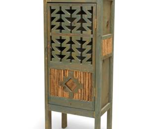1345 A New Mexican-style painted wood cabinet Late 20th/early 21st century With upper gallery above openwork cabinet door with inset wood rods, opening to reveal two shelves Inscribed right side proper: AVONO / MARTES 4DE JUNIO 50 / SAVADO 60 Height 64 in., width 23 3/4 in., depth 17 in. Estimate: $400 - $600