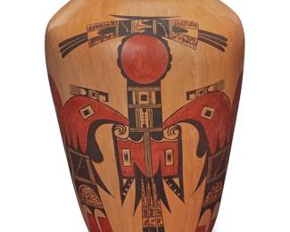 1042 Jean Sahmie Nampeyo (b. 1949, Hopi-Tewa) A polychrome yellowware pottery vase With rounded bottom, decorated with red and black avian and geometric motifs on cream slip ground Signed in slip to underside: JEAN SAHME NAMPEYO Height 11 1/4 in., diameter 7 1/2 in. Estimate: $800 - $1,200