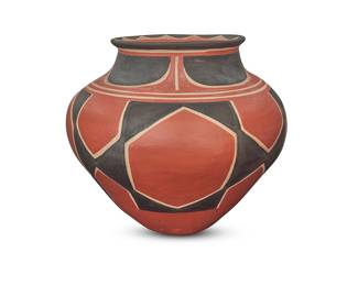 1059 Robert Tenorio (b. 1950, Kewa [Santo Domingo Pueblo]) A polychrome pottery jar Painted with red and black geometric motifs on white slip ground, above a slight puki indentation Incised to underside: Robert Tenorio / [stars] / Santo Domingo Pueblo / N.M / [Zia sun] Height 9 1/2 in., diameter 11 in. Estimate: $500 - $800