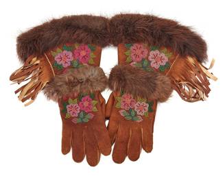 1126 A pair of Cree beaded moosehide and fur gloves Mid-20th century Attributed to Mary Ann Boardman (Cree; Saskatchewan, Canada) Comprising a pair of dark brown smoke tanned moosehide suede gauntlet gloves with polychrome floral beadwork, trimmed with beaver fur, hide fringing, and lined with cotton calico Each 16 x 10 in. approximately Estimate: $100 - $200