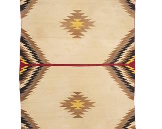 1277 A Diné (Navajo) double saddle blanket Mid-20th century Woven in cream, red, brown, grey, and yellow wool featuring two central serrated diamonds and serrated banding to corners, narrow striped banding to edges and to center, and abundant green and red yarn fringed tassels to each corner 4 ft. 1 1/2 in. x 2 ft. 9 in. approximately Estimate: $500 - $700